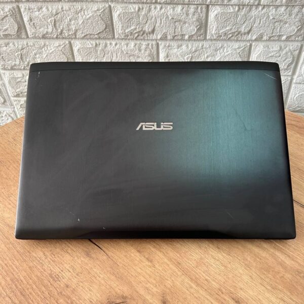 Ігровий ноутбук Б-клас Asus FX502VMZ / 15.6" (1920x1080) IPS / Intel Core i7-7700HQ (4 (8) ядра по 2.8 - 3.8 GHz) / 8 GB DDR4 / 128 GB SSD + 1000 GB HDD / nVidia GeForce GTX 1060, 3 GB GDDR5, 192-bit / WebCam - Зображення 3