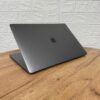 Ігровий ультрабук Б-клас Apple MacBook Pro A1990 2019 / 15.4" (2880x1800) IPS / Intel Core i9-9980HK (8 (16) ядер по 2.4 - 5.0 GHz) / 32 GB DDR4 / 1000 GB SSD / AMD Radeon Pro 560X, 4 GB GDDR5, 128-bit / WebCam / MacOS - Зображення 6
