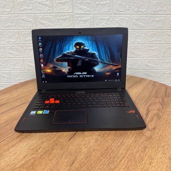 Ігровий ноутбук Б-клас Asus ROG Strix GL502VM / 15.6" (1920x1080) IPS / Intel Core i7-7700HQ (4 (8) ядра по 2.8 - 3.8 GHz) / 12 GB DDR4 / 500 GB SSD / nVidia GeForce GTX 1060, 3 GB GDDR5, 192-bit / WebCam - Зображення 2