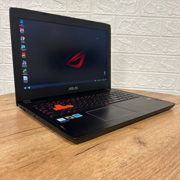 Ігровий ноутбук Б-клас Asus ROG Strix GL502VT / 15.6" (1920x1080) TN / Intel Core i7-6700HQ (4 (8) ядра по 2.6 - 3.5 GHz) / 12 GB DDR4 / 256 GB SSD NVMe + 1000 GB HDD / nVidia GeForce GTX 970M, 3 GB GDDR5, 192-bit / WebCam - Зображення 4