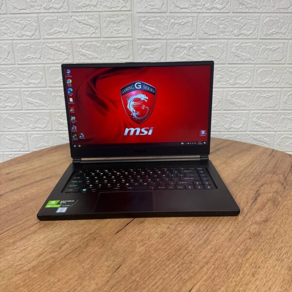 Ігровий ноутбук Б-клас MSI GS65 8RF Stealth Thin / 15.6" (1920x1080) IPS / Intel Core i7-8750H (6 (12) ядра по 2.2 - 4.1 GHz) / 32 GB DDR4 / 512 GB SSD / nVidia GeForce GTX 1070 Max-Q, 8 GB GDDR5, 256-bit / WebCam - Зображення 2