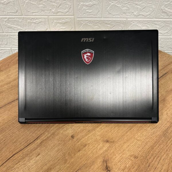 Ігровий ноутбук Б-клас MSI GS63VR Stealth 6RF / 15.6" (1920x1080) IPS / Intel Core i7-6700HQ (4 (8) ядра по 2.6 - 3.5 GHz) / 16 GB DDR4 / 128 GB SSD M.2 + 1000 GB HDD / nVidia GeForce GTX 1060, 6 GB GDDR5, 192-bit / WebCam - Зображення 3