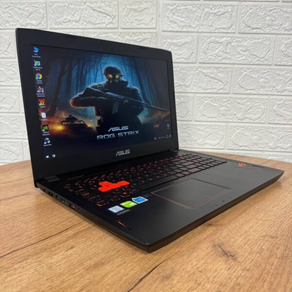 Ігровий ноутбук Б-клас Asus ROG Strix GL502VM / 15.6" (1920x1080) IPS / Intel Core i7-7700HQ (4 (8) ядра по 2.8 - 3.8 GHz) / 12 GB DDR4 / 500 GB SSD / nVidia GeForce GTX 1060, 3 GB GDDR5, 192-bit / WebCam - Зображення 4