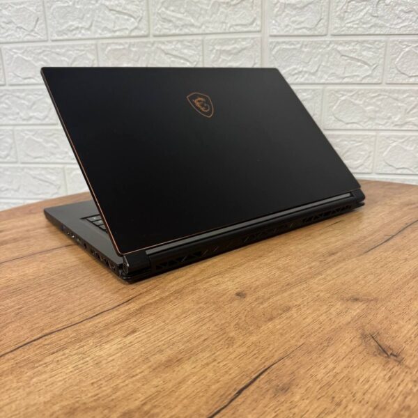Ігровий ноутбук Б-клас MSI GS65 8RF Stealth Thin / 15.6" (1920x1080) IPS / Intel Core i7-8750H (6 (12) ядра по 2.2 - 4.1 GHz) / 32 GB DDR4 / 512 GB SSD / nVidia GeForce GTX 1070 Max-Q, 8 GB GDDR5, 256-bit / WebCam - Зображення 6