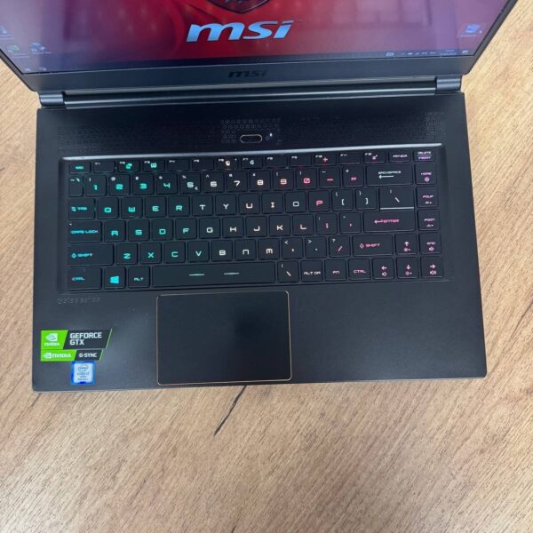 Ігровий ноутбук Б-клас MSI GS65 8RF Stealth Thin / 15.6" (1920x1080) IPS / Intel Core i7-8750H (6 (12) ядра по 2.2 - 4.1 GHz) / 32 GB DDR4 / 512 GB SSD / nVidia GeForce GTX 1070 Max-Q, 8 GB GDDR5, 256-bit / WebCam - Зображення 7