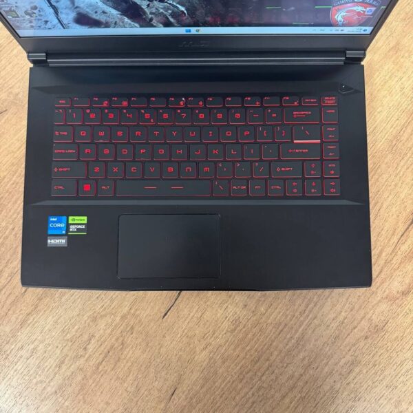 Ігровий ноутбук Б-клас MSI GF63 Thin 11UC / 15.6" (1920x1080) IPS / Intel Core i5-11400H (6 (12) ядер по 2.7 - 4.5 GHz) / 16 GB DDR4 / 512 GB SSD / nVidia GeForce RTX 3050, 4 GB GDDR6, 128-bit / WebCam - Зображення 7