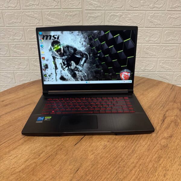 Ігровий ноутбук Б-клас MSI GF63 Thin 11UC / 15.6" (1920x1080) IPS / Intel Core i5-11400H (6 (12) ядер по 2.7 - 4.5 GHz) / 16 GB DDR4 / 512 GB SSD / nVidia GeForce RTX 3050, 4 GB GDDR6, 128-bit / WebCam - Зображення 2