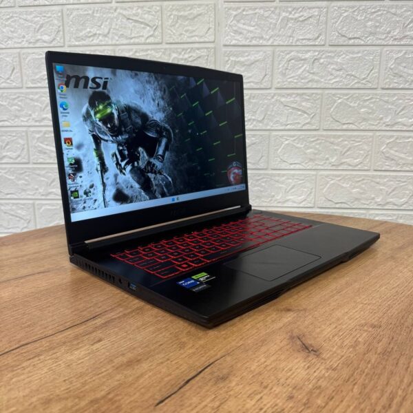 Ігровий ноутбук Б-клас MSI GF63 Thin 11UC / 15.6" (1920x1080) IPS / Intel Core i5-11400H (6 (12) ядер по 2.7 - 4.5 GHz) / 16 GB DDR4 / 512 GB SSD / nVidia GeForce RTX 3050, 4 GB GDDR6, 128-bit / WebCam - Зображення 4
