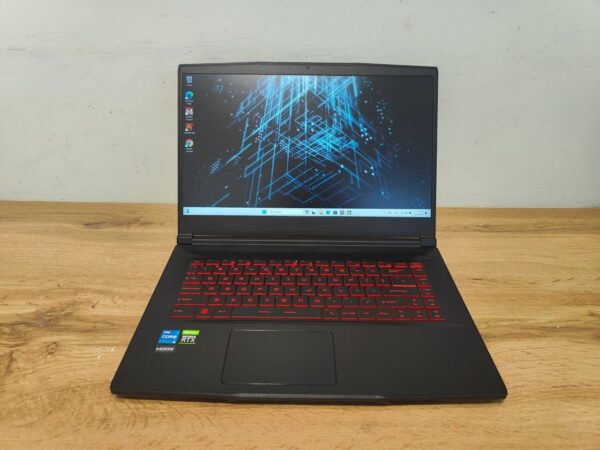 Ігровий ноутбук MSI GF63 Thin 11UC / 15.6" (1920x1080) IPS / Intel Core i5-11400H (6 (12) ядер по 2.7 - 4.5 GHz) / 16 GB DDR4 / 512 GB SSD / nVidia GeForce RTX 3050, 4 GB GDDR6, 128-bit / WebCam / Windows 11 - Зображення 2