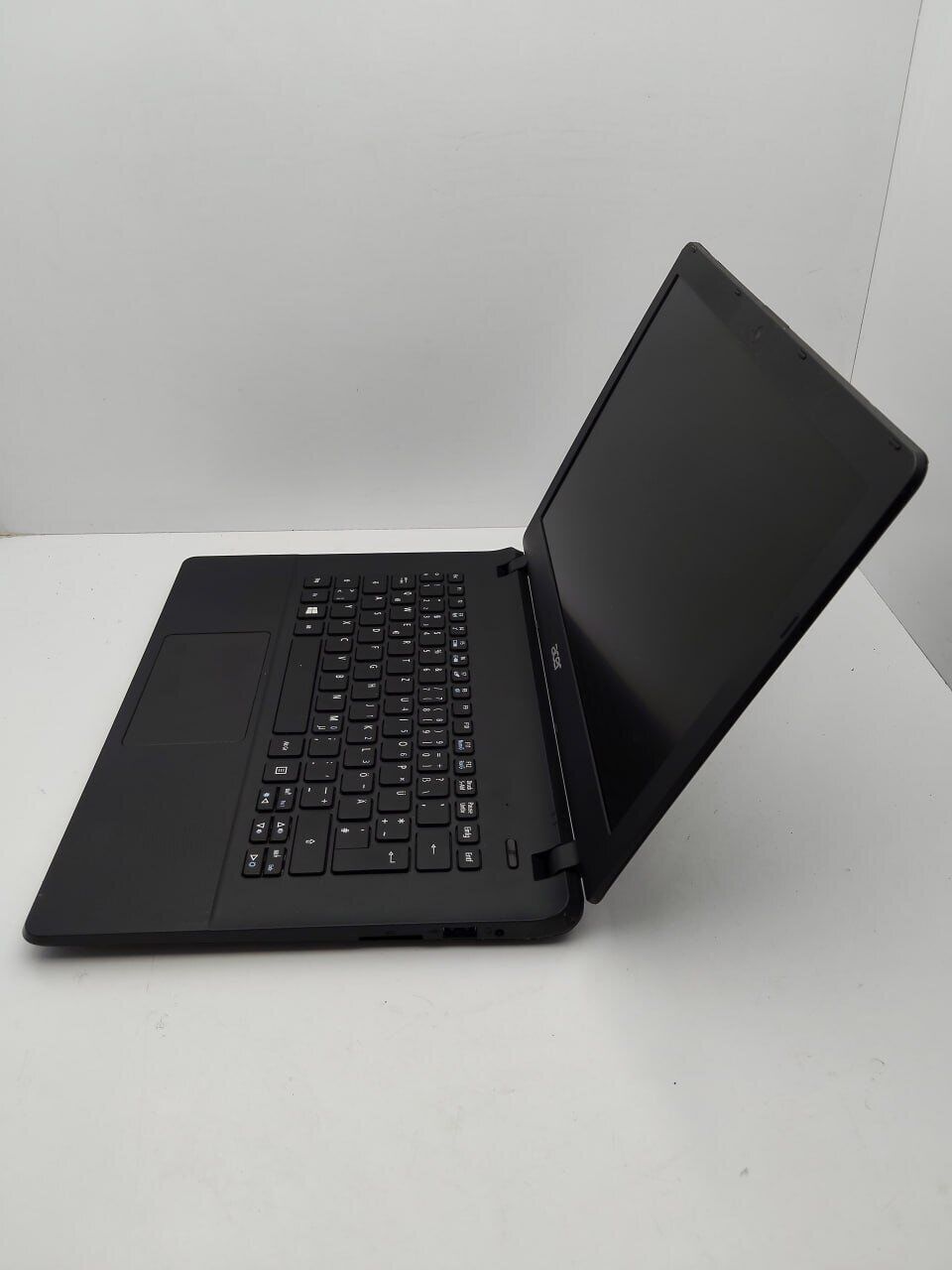 Ноутбук Acer E1-311 / 14" (1366x768) TN / Intel Celeron N2940 (4 ядра по 1.83 - 2.25 GHz) / 4 GB DDR3 / 500 GB HDD / Intel HD Graphics / WebCam - Зображення 6