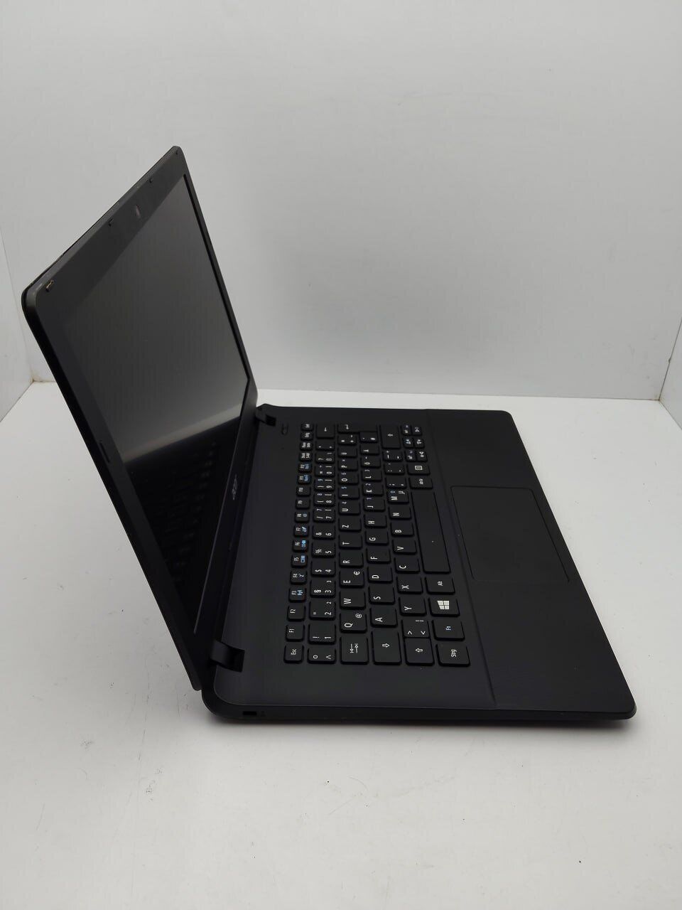 Ноутбук Acer E1-311 / 14" (1366x768) TN / Intel Celeron N2940 (4 ядра по 1.83 - 2.25 GHz) / 4 GB DDR3 / 500 GB HDD / Intel HD Graphics / WebCam - Зображення 5