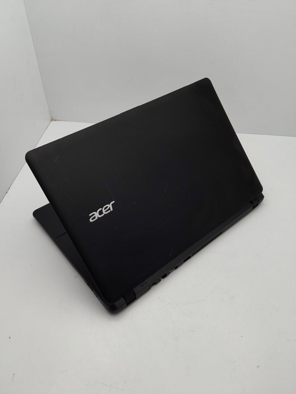 Ноутбук Acer E1-311 / 14" (1366x768) TN / Intel Celeron N2940 (4 ядра по 1.83 - 2.25 GHz) / 4 GB DDR3 / 500 GB HDD / Intel HD Graphics / WebCam - Зображення 8