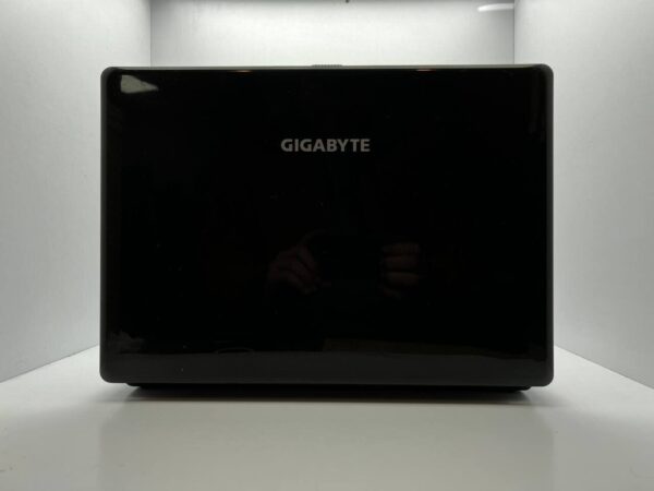 Ноутбук GIGABYTE E1500 / 15.6" (1366x768) TN / Intel Pentium T4400 (2 ядра по 2.2 GHz) / 4 GB DDR2 / 320 GB HDD / Intel GMA Graphics 4500M / Акб не держит - Зображення 5
