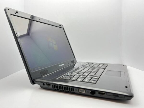 Ноутбук GIGABYTE E1500 / 15.6" (1366x768) TN / Intel Pentium T4400 (2 ядра по 2.2 GHz) / 4 GB DDR2 / 320 GB HDD / Intel GMA Graphics 4500M / Акб не держит - Зображення 3