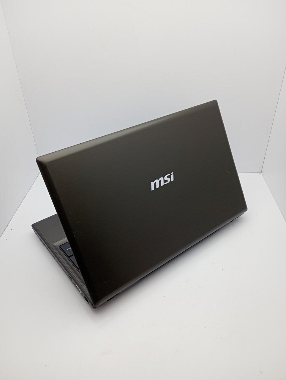 Ноутбук MSI CX61 / 15.6" (1366x768) TN / Intel Core i3-4000M (2 (4) ядра по 2.4 GHz) / 6 GB DDR3 / 500 GB HDD / Intel HD Graphic 4600 / WebCam - Зображення 5