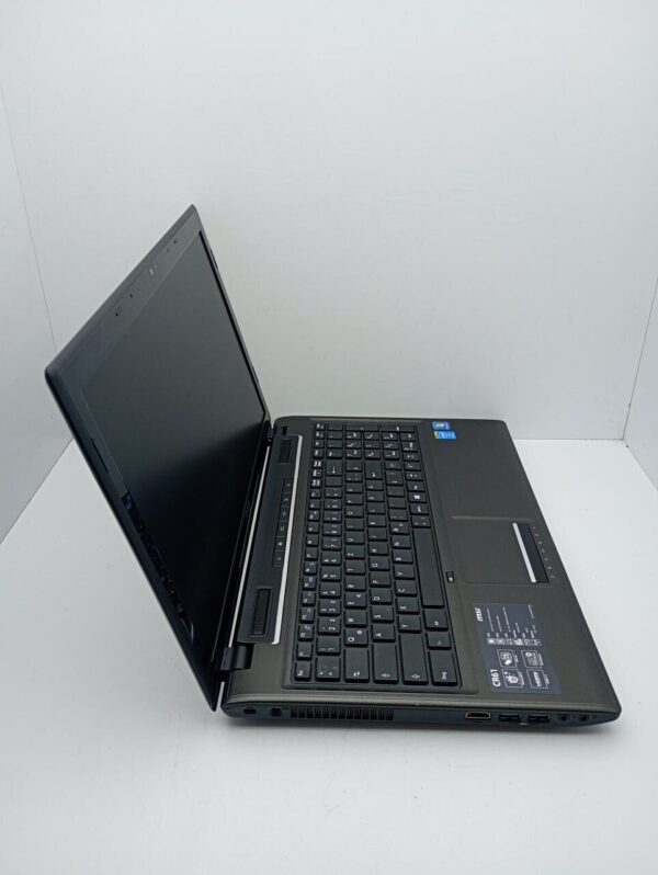 Ноутбук MSI CX61 / 15.6" (1600x900) TN / Intel Core i3-4100M (2 (4) ядра по 2.5 GHz) / 6 GB DDR3 / 120 GB SSD / Intel HD Graphics 4600 / WebCam - Зображення 5