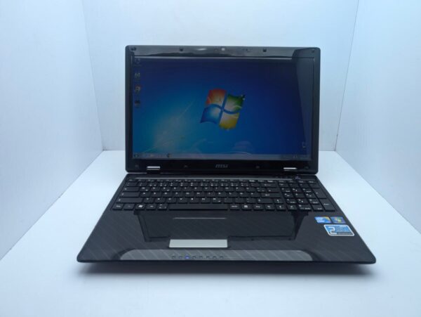 Ноутбук MSI CX63 / 15.6" (1366x768) TN / Intel Core i5-460M (2 (4) ядра по 2.53 - 2.8GHz) / 6 GB DDR3 / 500 GB HDD / nVidia GeForce 310M, 1 GB GDDR3, 64-bit / WebCam - Зображення 7