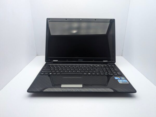 Ноутбук MSI CX63 / 15.6" (1366x768) TN / Intel Core i5-460M (2 (4) ядра по 2.53 - 2.8GHz) / 6 GB DDR3 / 500 GB HDD / nVidia GeForce 310M, 1 GB GDDR3, 64-bit / WebCam - Зображення 2