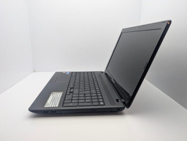 Ноутбук Packard Bell Easy Note TK85 / 15.6" (1366x768) TN / Intel Core i5-450M (2 (4) ядра по 2.4 - 2.66 GHz) / 6 GB DDR3 / 500 GB HDD / AMD Radeon HD 5470, 512 MB, GDDR5, 64-bit / WebCam - Зображення 4