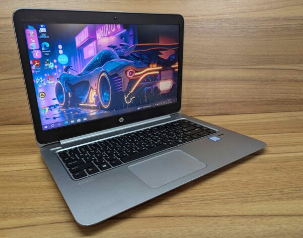 Ультрабук HP EliteBook Folio 1040 G3 / 14" (1920x1080) IPS / Intel Core i5-6200U (2 (4) ядра по 2.3 - 2.8 GHz) / 8 GB DDR4 / 256 GB SSD / Intel HD Graphics 520 / WebCam / Fingerprint / Windows 10 - Зображення 4