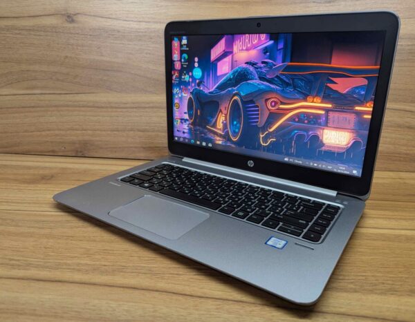 Ультрабук HP EliteBook Folio 1040 G3 / 14" (1920x1080) IPS / Intel Core i5-6300U (2 (4) ядра по 2.4 - 3.0 GHz) / 8 GB DDR4 / 256 GB SSD / Intel HD Graphics 520 / WebCam / Fingerprint / Windows 10 - Зображення 5
