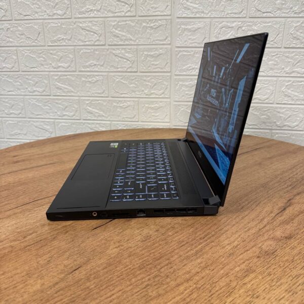 Мобільна робоча станція Б-клас MSI WS66 10TKT / 15.6" (1920x1080) IPS Touch / Intel Core i7-10875H (8 (16) ядер по 2.3 - 5.1 GHz) / 32 GB DDR4 / 1000 GB SSD / nVidia Quadro RTX 3000, 6 GB GDDR6, 192-bit / WebCam - Зображення 5