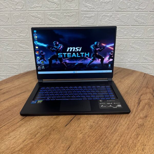 Ігровий ноутбук Б-клас MSI Stealth 15M A11UEKV / 15.6" (1920x1080) IPS / Intel Core i7-11375H (4 (8) ядра по 3.0 - 5.0 GHz) / 16 GB DDR4 / 512 GB SSD NVMe / nVidia GeForce RTX 3060, 6 GB GDDR6, 192-bit / WebCam - Зображення 2