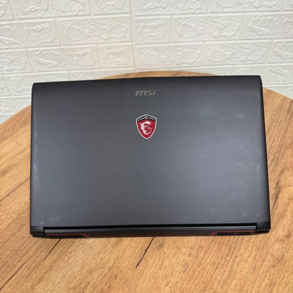 Ігровий ноутбук Б-клас MSI GL62M 7REX / 15.6" (1920x1080) TN / Intel Core i7-7700HQ (4 (8) ядра по 2.8 - 3.8 GHz) / 16 GB DDR4 / 256 GB SSD M.2 + 1000 GB HDD / nVidia GeForce GTX 1050 Ti, 4 GB GDDR5, 128-bit / WebCam - Зображення 3