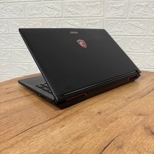 Ігровий ноутбук Б-клас MSI GL62M 7REX / 15.6" (1920x1080) TN / Intel Core i7-7700HQ (4 (8) ядра по 2.8 - 3.8 GHz) / 16 GB DDR4 / 256 GB SSD M.2 + 1000 GB HDD / nVidia GeForce GTX 1050 Ti, 4 GB GDDR5, 128-bit / WebCam - Зображення 6