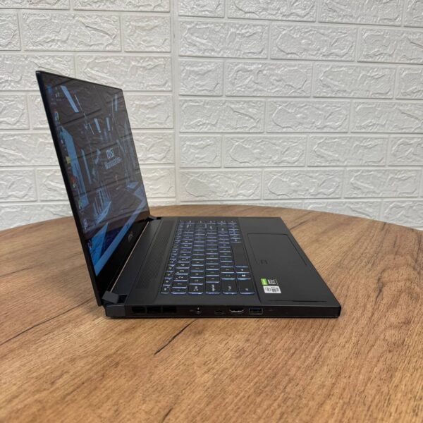 Мобільна робоча станція Б-клас MSI WS66 10TKT / 15.6" (1920x1080) IPS Touch / Intel Core i7-10875H (8 (16) ядер по 2.3 - 5.1 GHz) / 32 GB DDR4 / 1000 GB SSD / nVidia Quadro RTX 3000, 6 GB GDDR6, 192-bit / WebCam - Зображення 4