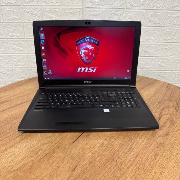 Ігровий ноутбук Б-клас MSI GL62M 7REX / 15.6" (1920x1080) TN / Intel Core i7-7700HQ (4 (8) ядра по 2.8 - 3.8 GHz) / 16 GB DDR4 / 256 GB SSD M.2 + 1000 GB HDD / nVidia GeForce GTX 1050 Ti, 4 GB GDDR5, 128-bit / WebCam - Зображення 2