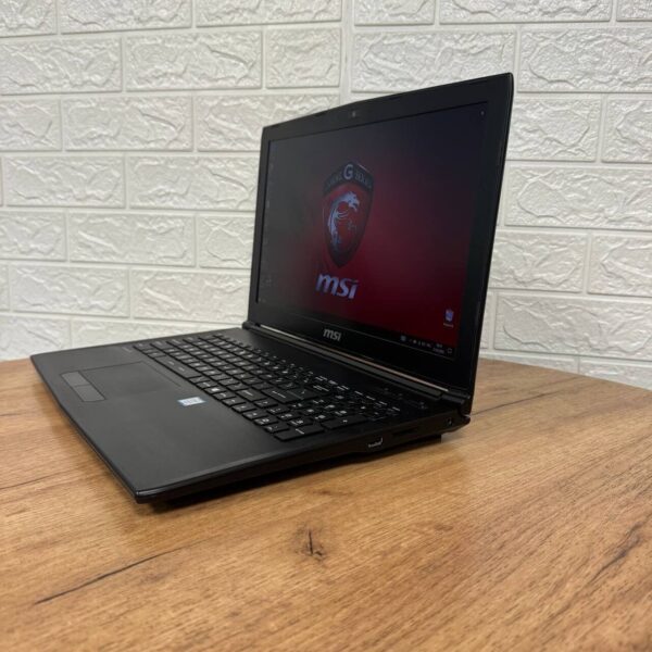 Ігровий ноутбук Б-клас MSI GL62M 7REX / 15.6" (1920x1080) TN / Intel Core i7-7700HQ (4 (8) ядра по 2.8 - 3.8 GHz) / 16 GB DDR4 / 256 GB SSD M.2 + 1000 GB HDD / nVidia GeForce GTX 1050 Ti, 4 GB GDDR5, 128-bit / WebCam - Зображення 5