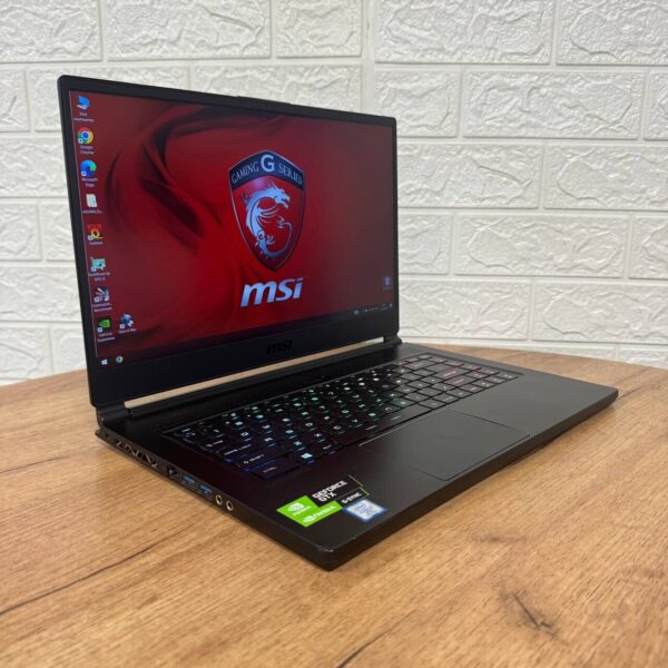 Ігровий ноутбук MSI GS65 Stealth Thin 8RF / 15.6" (1920x1080) IPS / Intel Core i7-8750H (6 (12) ядра по 2.2 - 4.1 GHz) / 32 GB DDR4 / 512 GB SSD NVMe / nVidia GeForce GTX 1070 Max-Q, 8 GB GDDR5, 256-bit / WebCam - Зображення 4