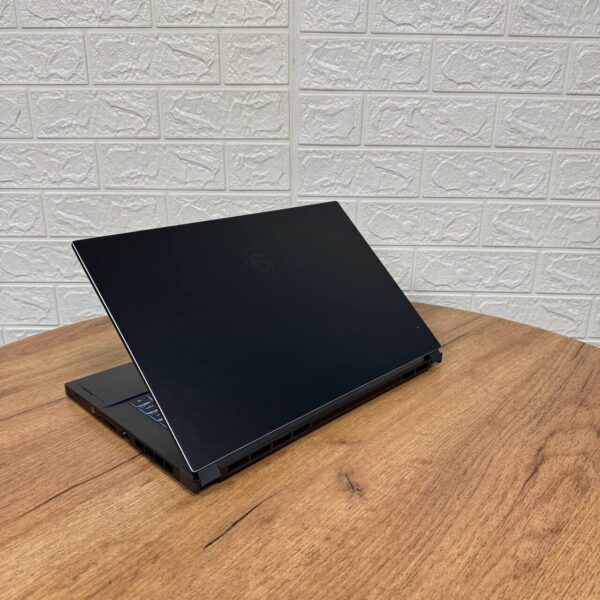 Мобільна робоча станція Б-клас MSI WS66 10TKT / 15.6" (1920x1080) IPS Touch / Intel Core i7-10875H (8 (16) ядер по 2.3 - 5.1 GHz) / 32 GB DDR4 / 1000 GB SSD / nVidia Quadro RTX 3000, 6 GB GDDR6, 192-bit / WebCam - Зображення 6