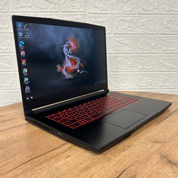 Ігровий ноутбук Б-клас MSI GF65 Thin 9SD / 15.6" (1920x1080) IPS / Intel Core i5-9300H (4 (8) ядра по 2.4 - 4.1 GHz) / 16 GB DDR4 / 512 GB SSD NVMe / nVidia GeForce GTX 1660 Ti, 6 GB GDDR6, 192-bit / WebCam - Зображення 4