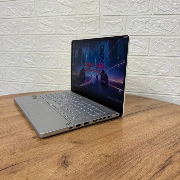 Ігровий ультрабук Б-клас Asus ROG Zephyrus G14 GA401IV / 14" (1920x1080) IPS / AMD Ryzen 9 4900HS (8 (16) ядер по 3.0 - 4.3 GHz) / 16 GB DDR4 / 1000 GB SSD NVMe / nVidia GeForce RTX 2060 Max-Q, 6 GB GDDR6, 192-bit - Зображення 5