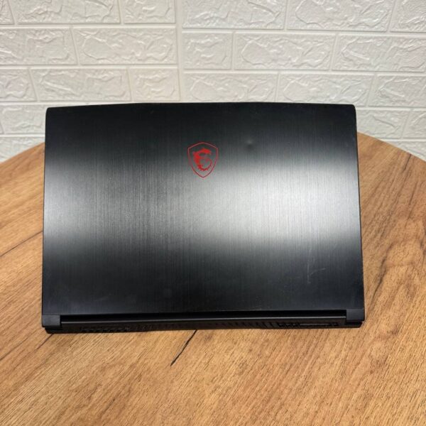 Ігровий ноутбук Б-клас MSI GF65 Thin 9SD / 15.6" (1920x1080) IPS / Intel Core i7-9750H (6 (12) ядер по 2.6 - 4.5 GHz) / 16 GB DDR4 / 512 GB SSD NVMe / nVidia GeForce GTX 1660 Ti, 6 GB GDDR6, 192-bit / WebCam - Зображення 3