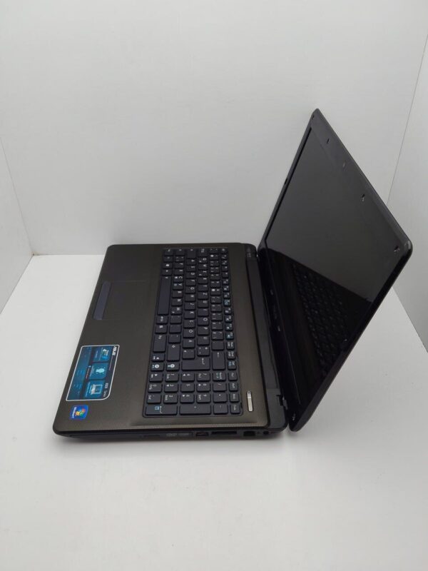 Ноутбук Asus K52 / 15.6" (1366x768) TN / Intel Core i3-350M (2 (4) ядра по 2.26 GHz) / 6 GB DDR3 / 320 GB HDD / AMD Radeon HD 5400 / WebCam - Зображення 6
