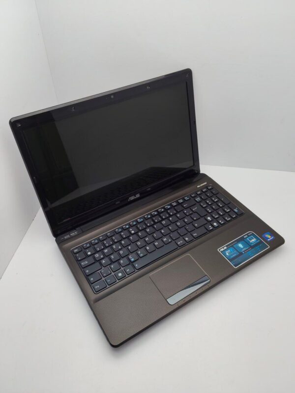 Ноутбук Asus K52 / 15.6" (1366x768) TN / Intel Core i3-350M (2 (4) ядра по 2.26 GHz) / 6 GB DDR3 / 320 GB HDD / AMD Radeon HD 5400 / WebCam - Зображення 3