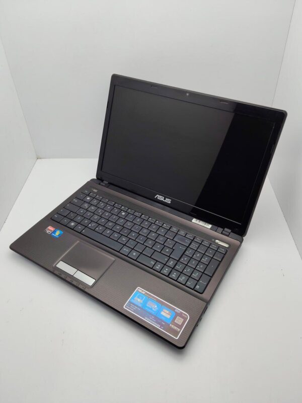 Ноутбук Asus K53 / 15.6" (1366x768) TN / AMD A6-3420M (4 ядра по 1.5 - 2.4 GHz) / 6 GB DDR3 / 500 GB HDD / AMD Radeon HD 6520G Graphics / WebCam / VGA - Зображення 4