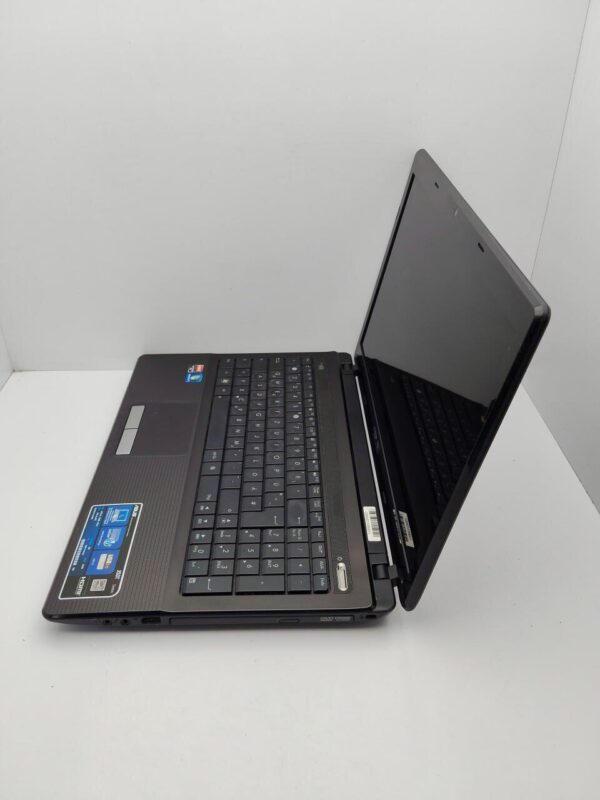 Ноутбук Asus K53 / 15.6" (1366x768) TN / AMD A6-3420M (4 ядра по 1.5 - 2.4 GHz) / 6 GB DDR3 / 500 GB HDD / AMD Radeon HD 6520G Graphics / WebCam / VGA - Зображення 6