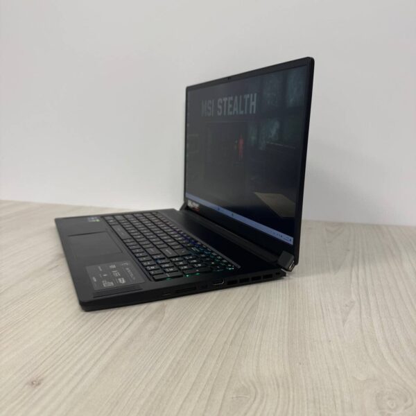 Ігровий ноутбук Б-клас MSI GS76 Stealth 11UG / 17.3" (1920x1080) IPS / Intel Core i9-11900H (8 (16) ядер по 2.5 - 4.9 GHz) / 32 GB DDR4 / 1000 GB SSD NVMe / nVidia GeForce RTX 3070, 8 GB GDDR6, 256-bit / WebCam - Зображення 5