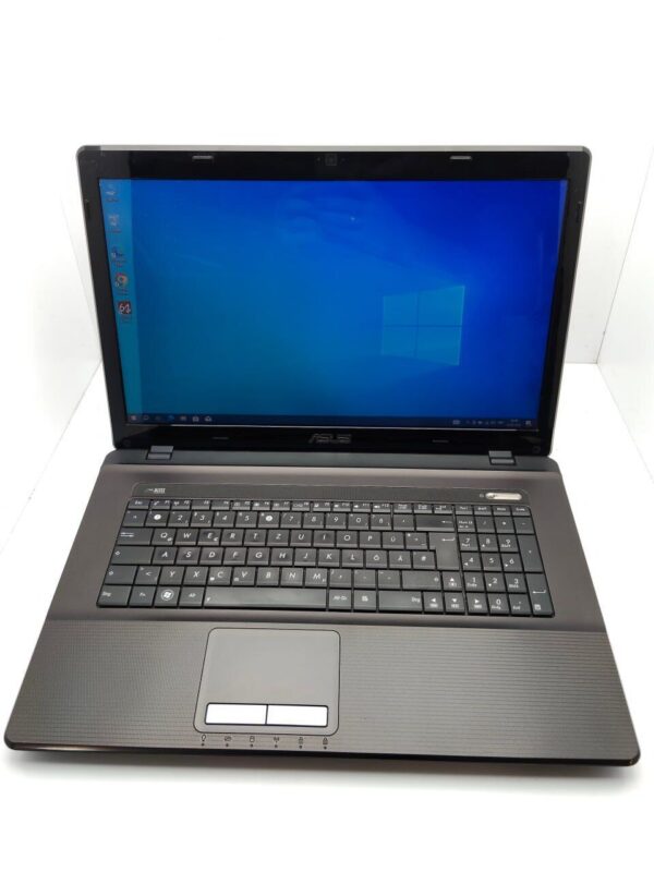 Ноутбук Asus K73 / 17.3" (1600x900) TN / AMD A6-3420M (4 ядра по 1.5 - 2.4 GHz) / 6 GB DDR3 / 120 GB SSD / AMD Radeon HD 7670M, 1 GB GDDR3, 128-bit / WebCam - Зображення 2