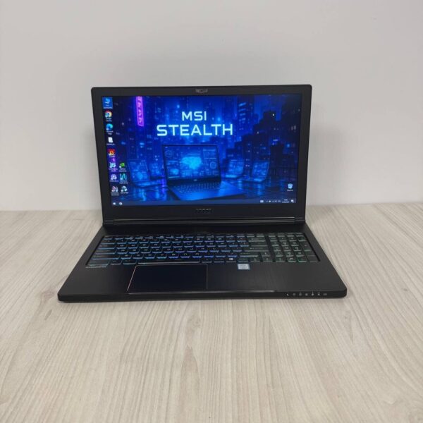 Ігровий ноутбук Б-клас MSI GS63VR 7RF Stealth Pro / 15.6" (1920x1080) TN / Intel Core i7-7700HQ (4 (8) ядра по 2.8 - 3.8 GHz) / 16 GB DDR4 / 256 GB SSD M.2 / nVidia GeForce GTX 1060, 6 GB GDDR5, 192-bit / WebCam - Зображення 2