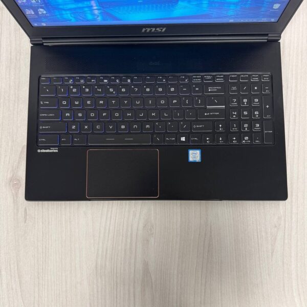 Ігровий ноутбук Б-клас MSI GS63VR 7RF Stealth Pro / 15.6" (1920x1080) TN / Intel Core i7-7700HQ (4 (8) ядра по 2.8 - 3.8 GHz) / 16 GB DDR4 / 256 GB SSD M.2 / nVidia GeForce GTX 1060, 6 GB GDDR5, 192-bit / WebCam - Зображення 7