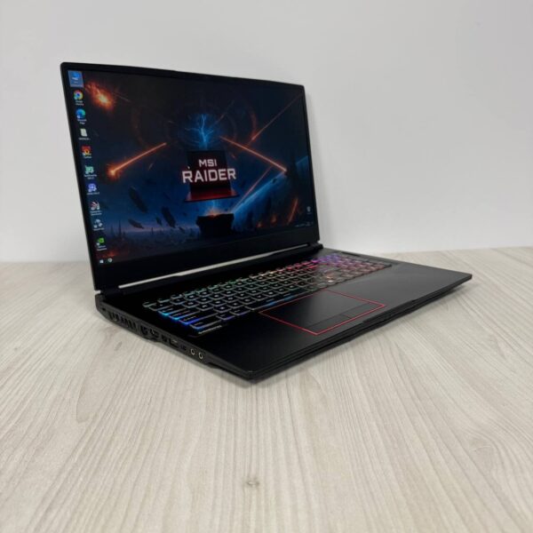 Ігровий ноутбук MSI GE75 Raider 10SFS / 17.3" (1920x1080) IPS / Intel Core i7-10750H (6 (12) ядер по 2.6 - 5.0 GHz) / 16 GB DDR4 / 128 GB SSD NVMe + 1000 GB HDD / nVidia GeForce RTX 2060, 6 GB GDDR6, 192-bit / WebCam - Зображення 4
