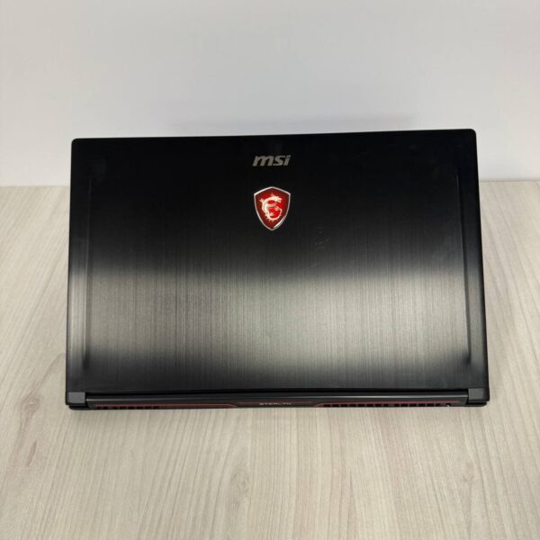 Ігровий ноутбук Б-клас MSI GS63VR 7RF Stealth Pro / 15.6" (1920x1080) TN / Intel Core i7-7700HQ (4 (8) ядра по 2.8 - 3.8 GHz) / 16 GB DDR4 / 256 GB SSD M.2 / nVidia GeForce GTX 1060, 6 GB GDDR5, 192-bit / WebCam - Зображення 3
