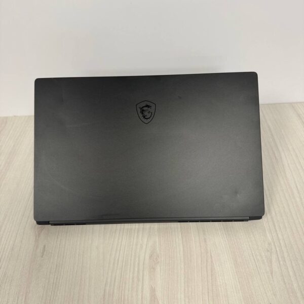 Ігровий ноутбук Б-клас MSI GS76 Stealth 11UG / 17.3" (1920x1080) IPS / Intel Core i9-11900H (8 (16) ядер по 2.5 - 4.9 GHz) / 32 GB DDR4 / 1000 GB SSD NVMe / nVidia GeForce RTX 3070, 8 GB GDDR6, 256-bit / WebCam - Зображення 3