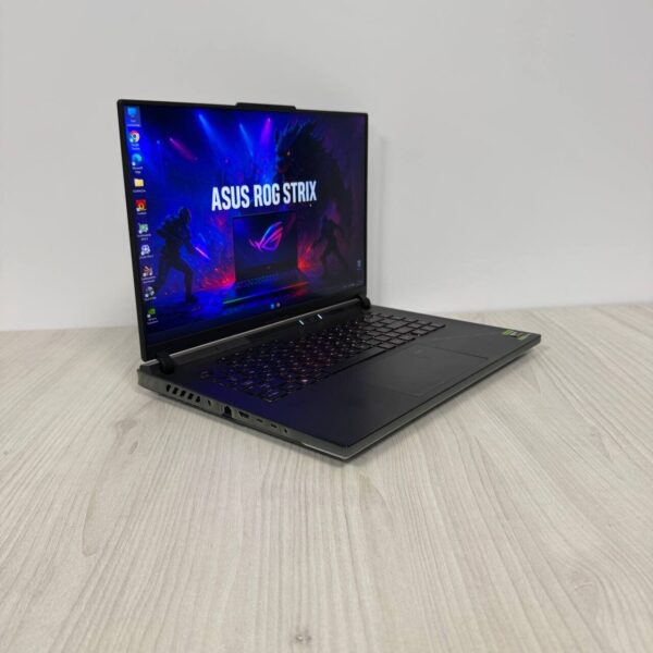 Ігровий ноутбук Б-клас Asus ROG Strix Scar 16 G634JZ / 16" (2560x1600) IPS / Intel Core i9-13980HX (24 (32) ядер по 2.2 - 5.5 GHz) / 32 GB DDR5 / 1000 GB SSD NVMe / nVidia GeForce RTX 4080, 12 GB GDDR6, 192-bit / WebCam - Зображення 4