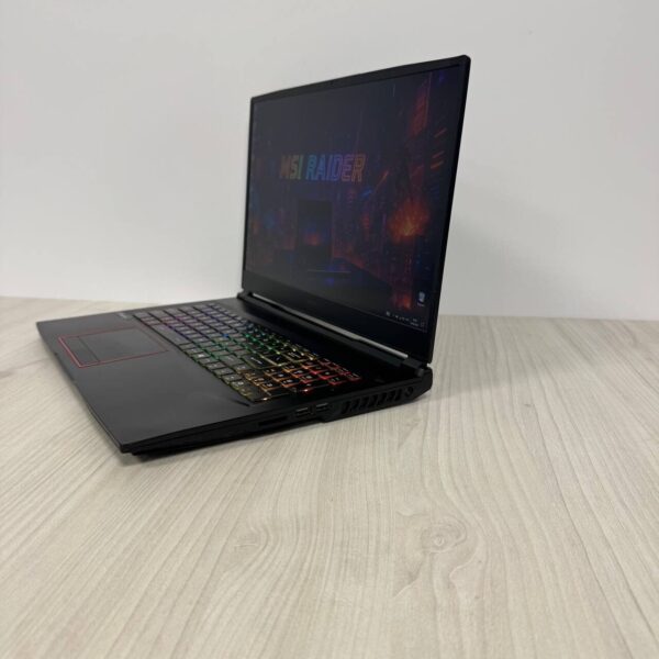 Ігровий ноутбук Б-клас MSI GE75 Raider 10SF / 17.3" (1920x1080) IPS / Intel Core i7-10750H (6 (12) ядер по 2.6 - 5.0 GHz) / 16 GB DDR4 / 512 GB SSD NVMe + 1000 GB HDD / nVidia GeForce RTX 2070, 8 GB GDDR6, 256-bit / WebCam - Зображення 5
